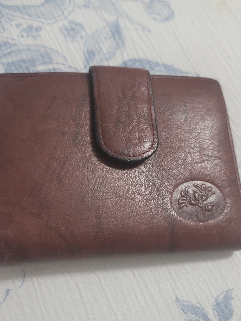 Rich Burgandy Leather Snap Wallet with Embossed Floral Emblem